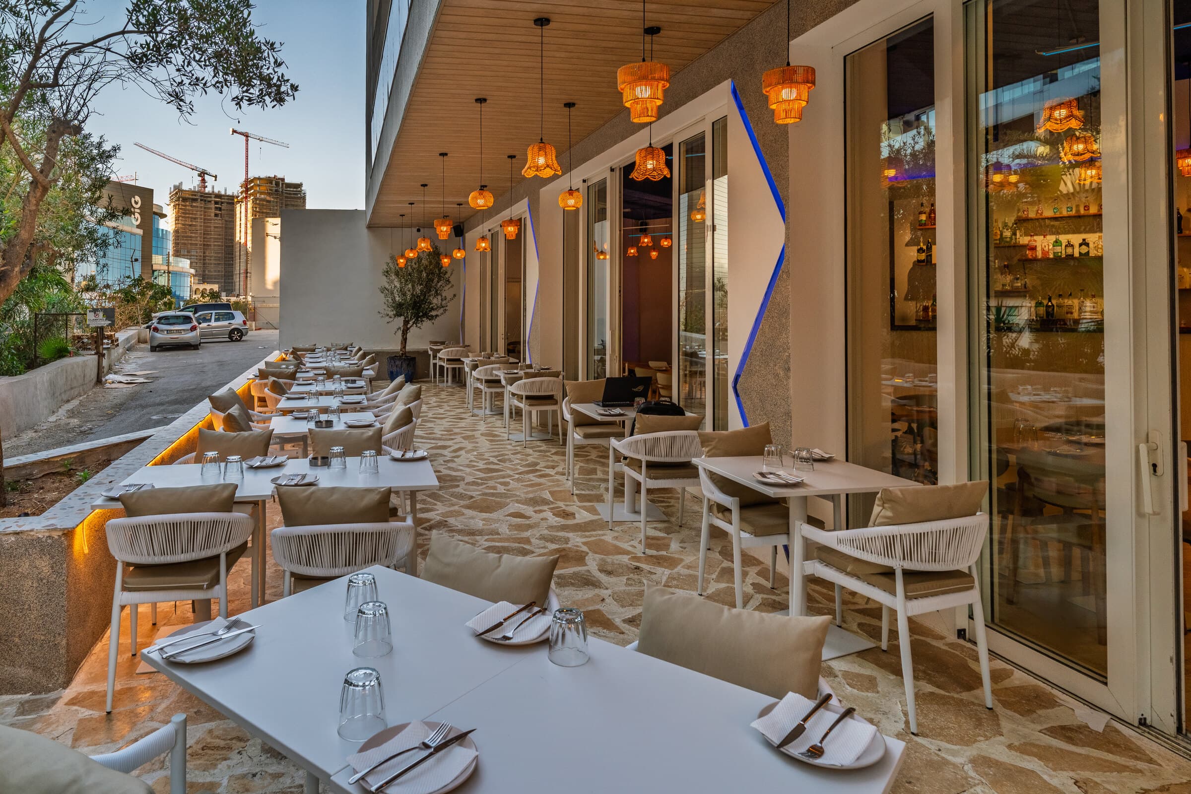Kreta Greek restaurant terrace at dusk on St George's Road, Paceville, Malta