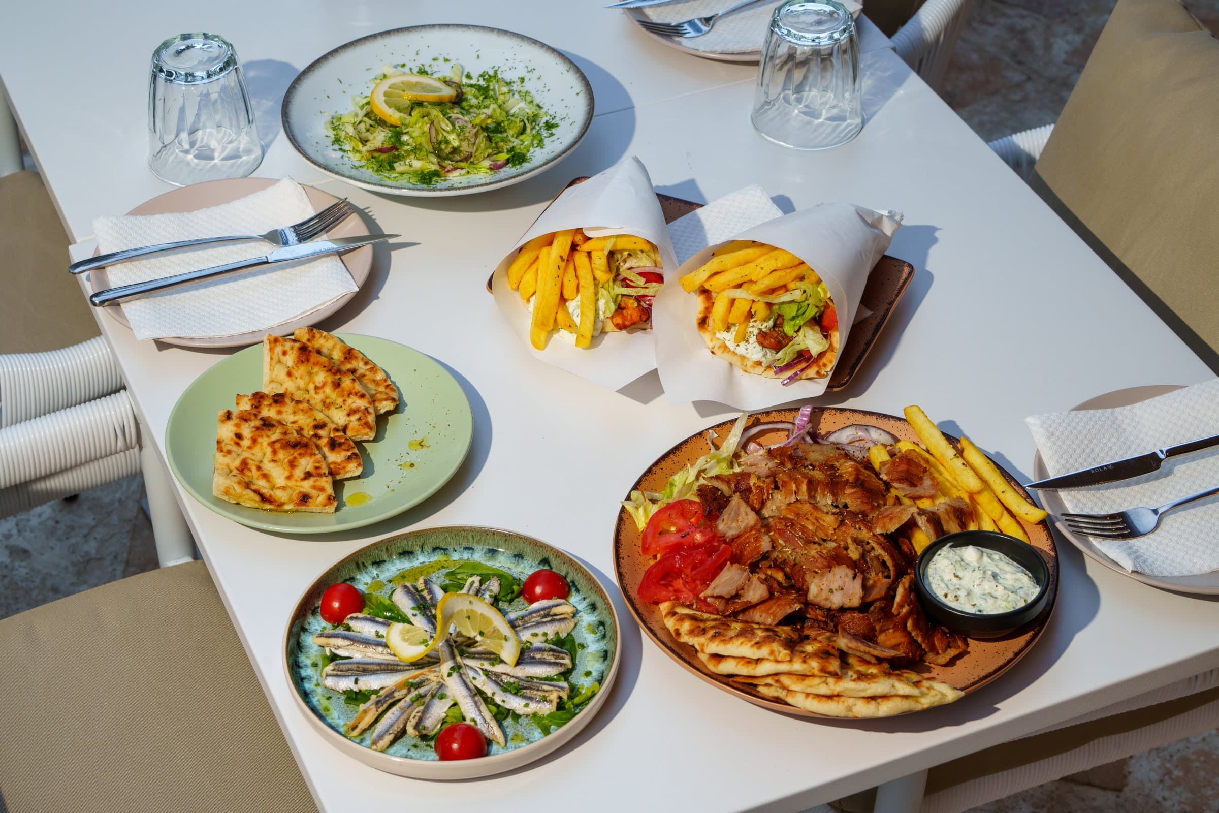 Gyros, a gyro plate, anchovies, green salad and pita on the Kreta terrace in Paceville