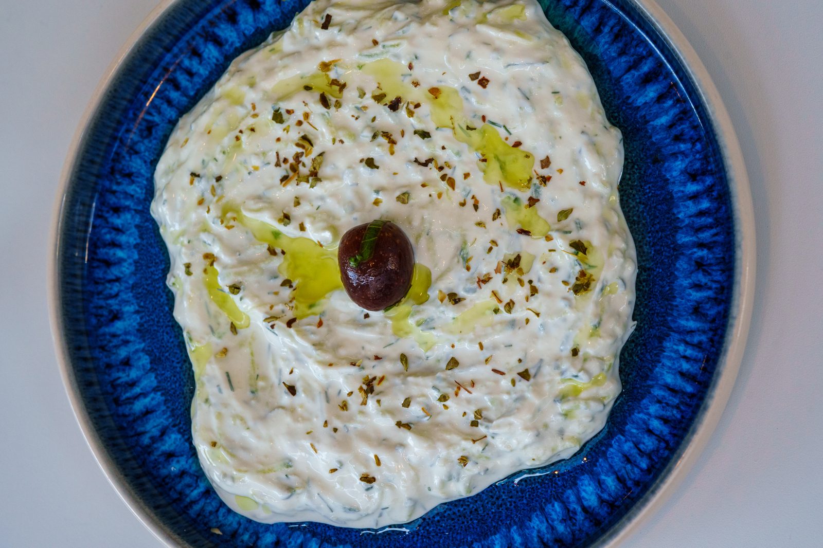 Real Greek tzatziki made with strained yogurt, olive oil, oregano and a kalamata olive at Kreta Malta